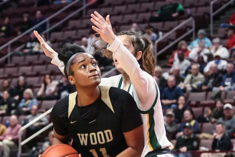 Archbishop Wood Deja Evans (11) in action against Lansdale Catholic during the PIAA 4a District XII Championship in March.