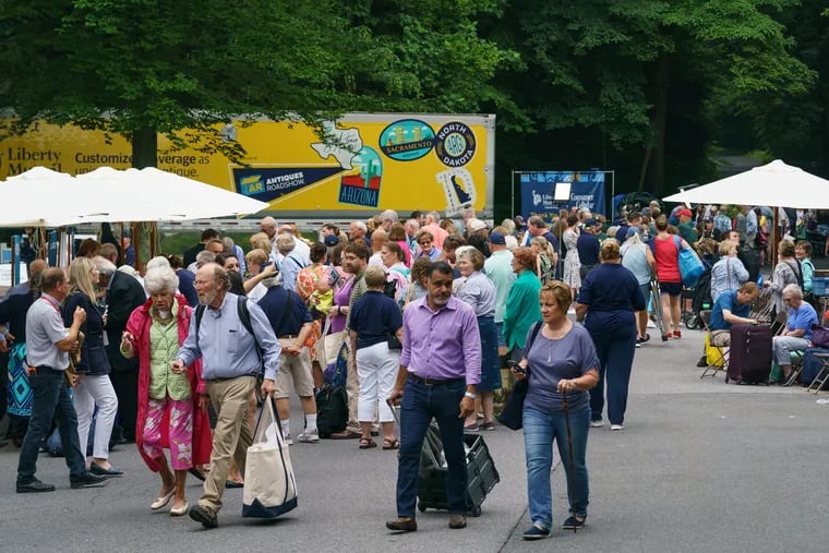 People visit the "Antiques Roadshow" at Winterthur Museum & Gardens in Delaware on Tuesday.