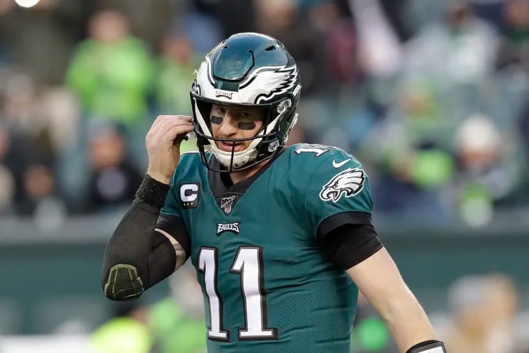 Eagles quarterback Carson Wentz walks back to the sidelines after failing on a late-fourth quarter two point conversion against the Seattle Seahawks on Sunday, November 24, 2019 in Philadelphia.
