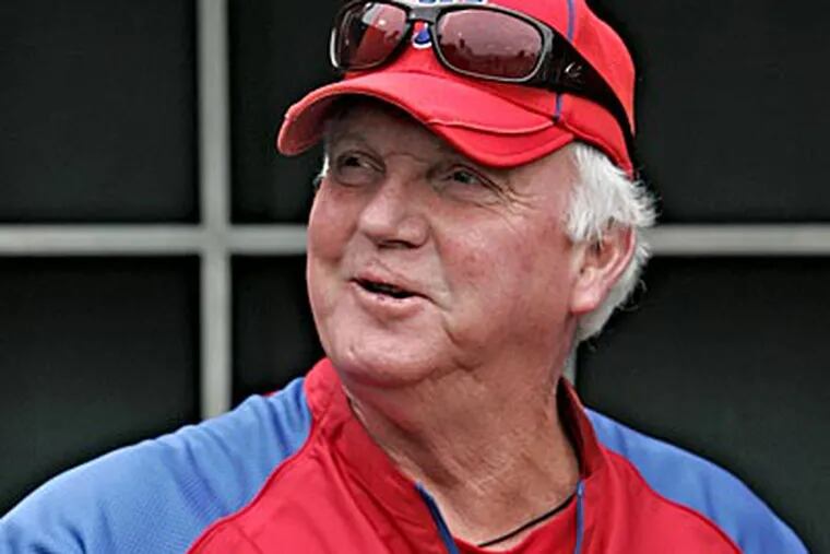 Charlie Manuel's contract extension keeps him with the Phillies until 2013. (David M Warren/Staff Photographer)