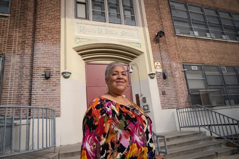 Dawn Pittman in front of the Davis School in East Camden where she was a teacher for years.  Camden schools are shuttered because of the pandemic and teachers are doing remote learning. Pittman wants to return to the district as a substitute when students are back in the classroom.