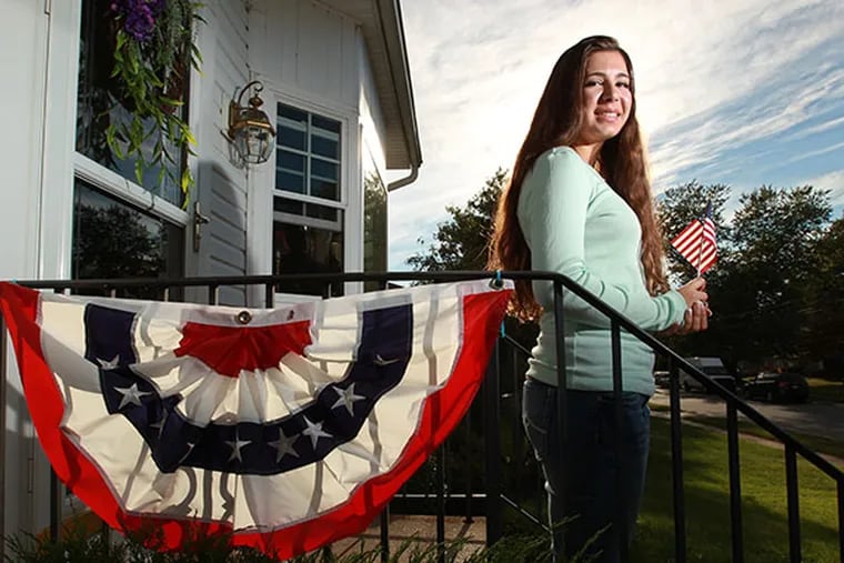 Samantha Jones, 18, stands on her front porch as one of the defendants in the Pledge of Allegiance case in New Jersey.  ( MICHAEL BRYANT  / Staff Photographer )