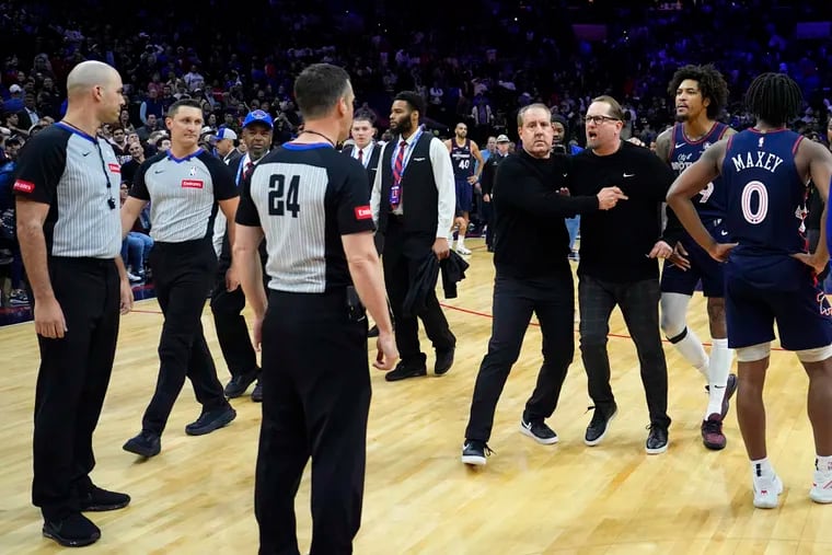 Sixers coach Nick Nurse (third from right) berates the officials after the loss to the Los Angeles Clippers on Wednesday night.