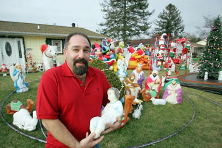Neil DiSpirito of Levittown, Pa., is Christmas crazy. He's had five baby Jesus' stolen over the years. (David Swanson / Staff Photographer)