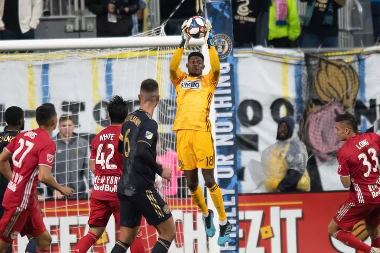 After giving up three goals in the first half against the New York Red Bulls, Philadelphia Union goalkeeper Andre Blake (18) steadied himself in the second half with strong support from his teammates.