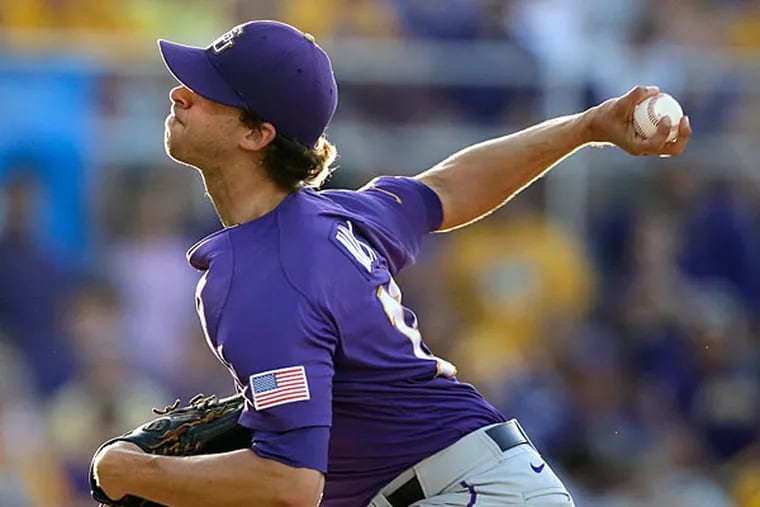 Aaron Nola (10) pitches in the first inning of an NCAA college baseball regional tournament game against Houston in Baton Rouge, La., Saturday, May 31, 2014. (Gerald Herbert/AP)