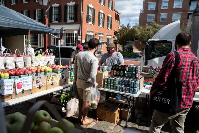 Folks shopping at Headhouse Square Farmers Market in Philadelphia, Pa. on Sunday, October 4, 2020.