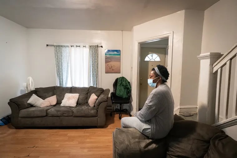 Georgia Knox, shown in November in her Nicetown living room. The mother of three says mold has infested her rented home, making breathing difficult. The property is linked to ABC Capital, which is being probed by the state Attorney General's office.