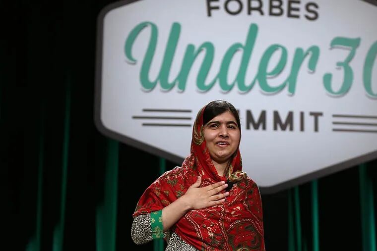 Malala Yousafzai finishes her talk at the Forbes Under 30 Summit in Philadelphia on October 21, 2014. ( DAVID MAIALETTI / Staff Photographer )