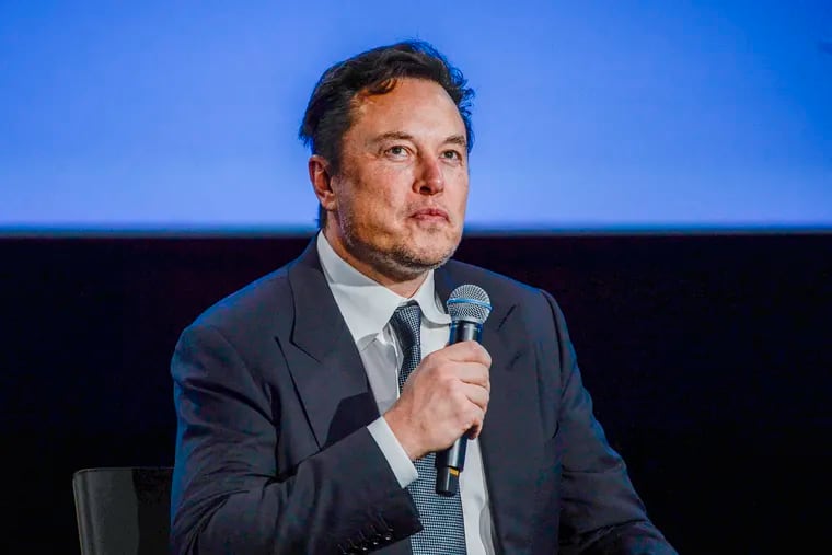 Tesla CEO Elon Musk looks up as he addresses guests at the Offshore Northern Seas 2022 meeting in Stavanger, Norway, on Aug. 29, 2022. (Carina Johansen/NTB/AFP/Getty Images/TNS) **Norway OUT**