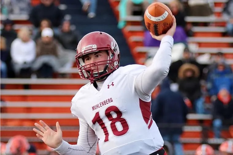 Michael Hnatkowsky throwing a pass for Muhlenberg College.