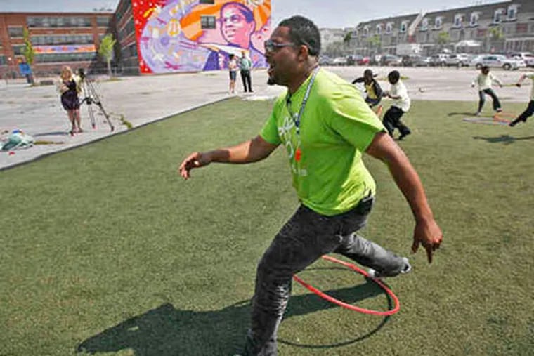 Joe Cokes of Oakland, Calif., is a "recess coach" hired to help kids learn to play constructively during recess. (Alejandro A. Alvarez/Staff Photographer)