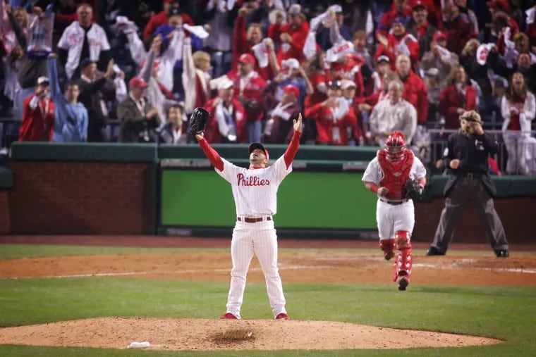 J.C. Romero celebrates the Phillies 10-2 victory over the Rays after the final out of Game 4 of the 2008 World Series on Oct. 26, 2008.