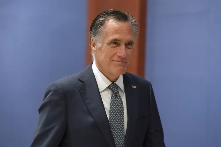 Sen. Mitt Romney, R-Utah, arrives to watch a speech by Ukrainian President Volodymyr Zelenskyy live-streamed into the U.S. Capitol, in Washington in March.