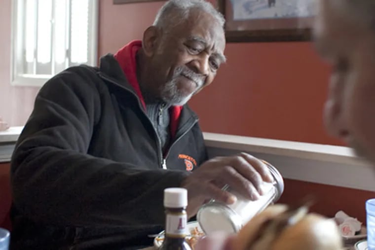 Louis Mickens-Thomas, 82, just released from Graterford Prison after serving 45 years for a crime he says he didn't commit, is treated to his favorite meal, at Tommy Mo's in Collegeville. (Ed Hille / Staff Photographer)