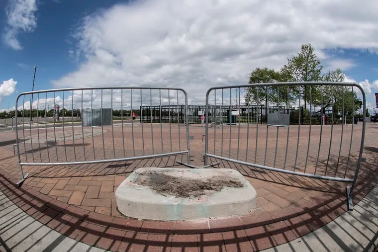 An empty concrete stand marks the spot where the statue of singer Kate Smith had been displayed at Xfinity Live!