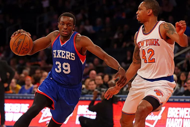 Philadelphia 76ers forward Jerami Grant (39) drives to the basket defended by New York Knicks forward Lance Thomas (42) during the first half at Madison Square Garden. (Adam Hunger/USA Today)