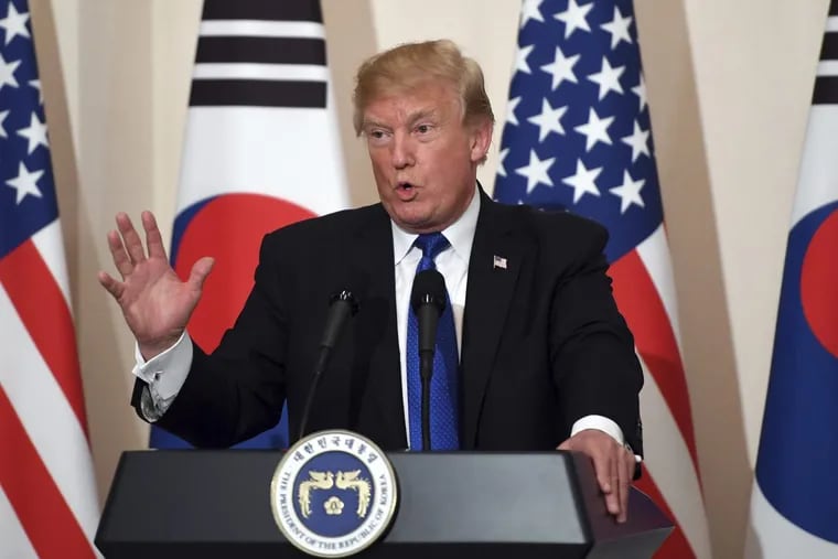 US President Donald Trump speaks during a joint press conference with South Korean President Moon Jae-In at the presidential Blue House in Seoul on November 7, 2017.