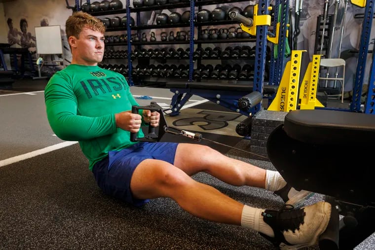 Jerry Rullo, a Notre Dame linebacker, training in Penn Charter's weight room on Aug. 1.