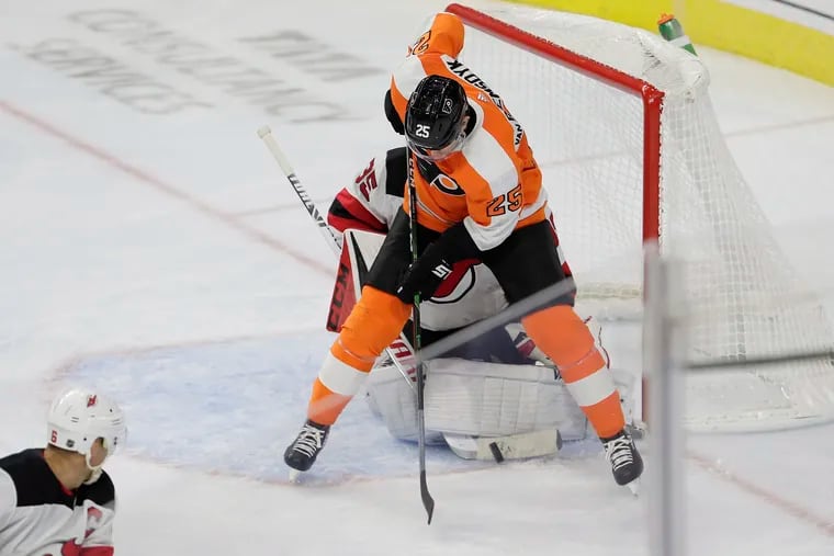 Flyers left winger James van Riemsdyk is denied by Devils goalie Cory Schneider in a game last month.