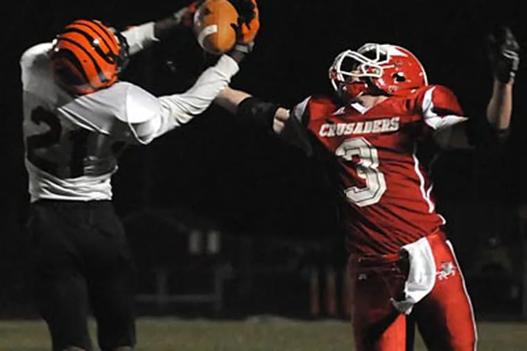 Delsea’s Tyler Coulbourn (right) scored twice Friday as the Crusaders got some playoff payback against Woodrow Wilson. ( David M Warren / Staff Photographer )