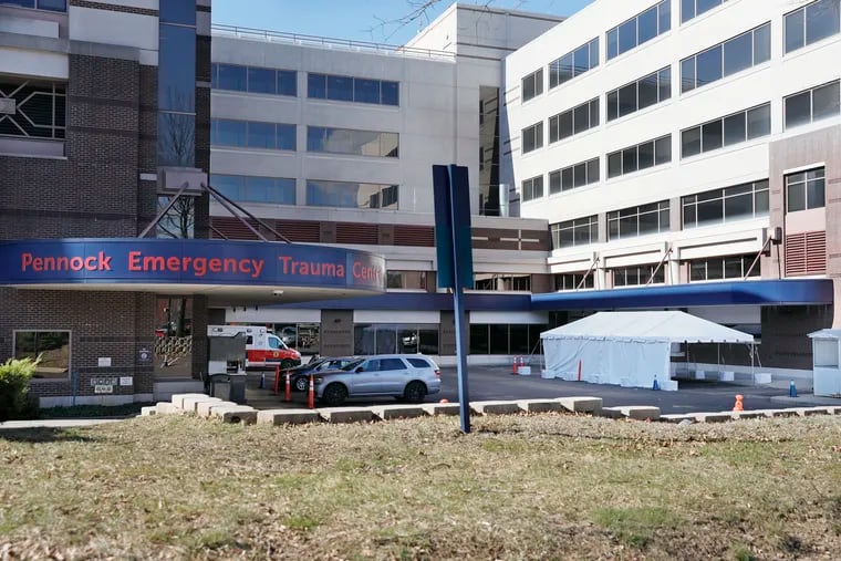 A temporary shelter has been set up in the parking lot directly in front of the Pennock Emergency Trauma Center entrance at Abington Hospital Jefferson Health in Abington, Pa. on March 15, 2020.  The coronavirus has been spreading across the globe since January, and now has been identified in the Philadelphia region.