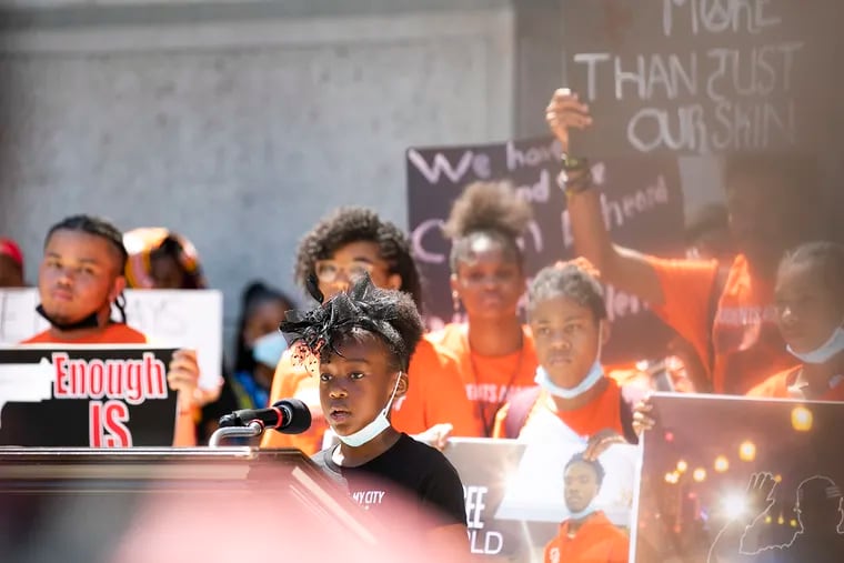 Kylee Pearson, of Sankofa Freedom Academy Charter School, speaks during a rally against gun violence at City Hall in Philadelphia on Tuesday, May 31, 2022. Students from nine Philly schools held a rally demanding answers and more support for young people around the effects of gun violence.