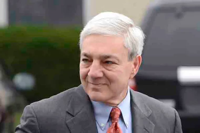 Former Penn State president Graham Spanier arrives at Harrisburg District Judge William Wenner's office Wednesday Nov. 7, 2012 in Harrisburg, Pa. Spanier was arraigned and released on bail at the brief court appearance on charges he lied about and concealed child sex abuse allegations involving former assistant football coach Jerry Sandusky. (AP Photo/Jason Minick)