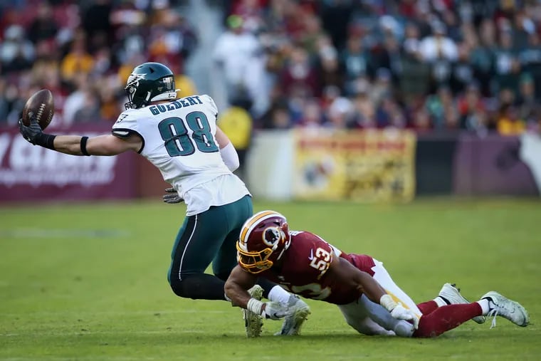 Eagles tight end Dallas Goedert (88) makes a catch past Washington Redskins inside linebacker Jon Bostic (53) in the fourth quarter of a game at FedEx Field in Landover, Md., on Sunday, Dec. 15, 2019. The Eagles won 37-27.
