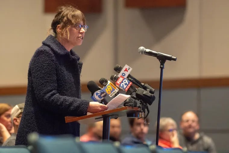 Kate Nazemi addresses the Central Bucks school board during a meeting Tuesday at Central Bucks West High School in Doylestown. The board heard public comment on a severance package for the superintendent and a policy on transgender athletes.