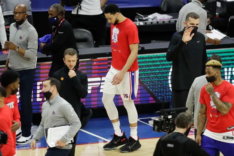 Ben Simmons walks off the court after the Sixers lost Game 7 and the second-round playoff series to the Hawks on June 20.