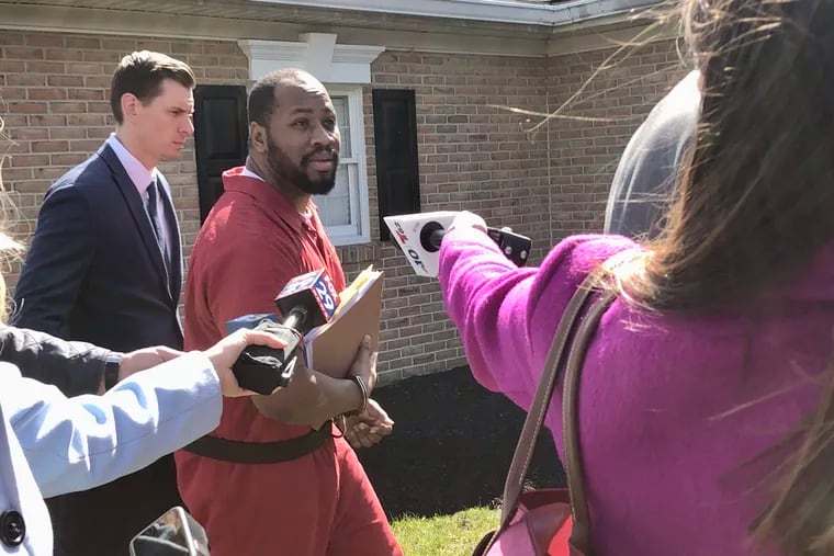 Blair Watts speaks to the media as he is escorted into district court in Limerick for his preliminary hearing. Watts is accused of killing his friend and business partner, Jennifer Brown.