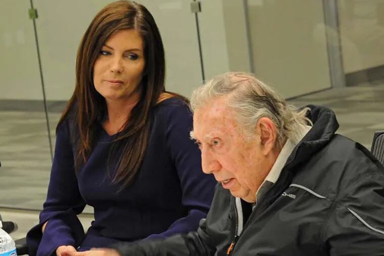 Pennsylvania Attorney General Kathleen Kane (left) listens as attorney Richard A. Sprague (right) speaks during a meeting March 20, 2014 at the offices of The Philadelphia Inquirer.    ( CLEM MURRAY / Staff Photographer )