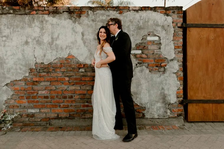 In this Saturday, April 20, 2019, photo provided by Katch Silva, Michelle Branch and Patrick Carney pose for a photo in New Orleans. The Grammy-winning musicians tied the knot Saturday at the Marigny Opera House in front of close friends and family, a representative for Carney told The Associated Press on Sunday. (Katch Silva via AP)