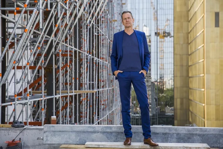 Mathias Doepfner, chief executive officer of Axel Springer SE, poses for a photograph on the construction site of German publishing house's new digital headquarters in Berlin. Doepfner envisions a high-tech hub of online brands that will ensure the company's prosperity and help realize his own corporate construction project: Turning Springer into the world's most successful digital publisher.