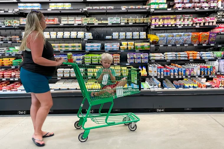 A shopper and her son at the Amazon Fresh grocery store off Easton Road in Warrington, Bucks County, on Aug. 5, 2021.