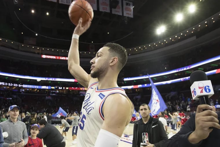 Ben Simmons of the Sixers throws an autographed ball into the stands after being named player of the game following their 103-97 victory over the Heat on Feb. 2, 2018.
