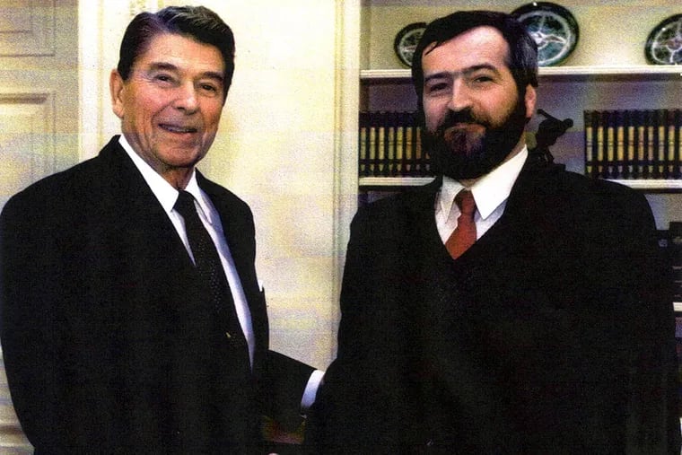 John C. McGraw (right) with President Ronald Reagan, who named him U.S. chief assayer.