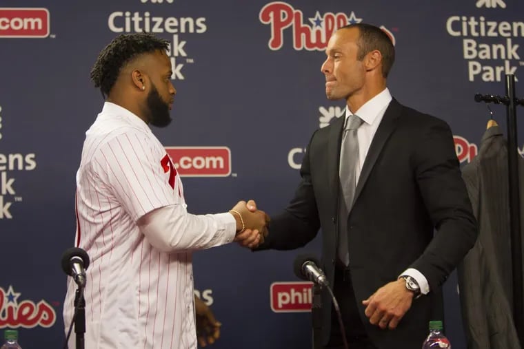 Philadelphia Phillies manager Gabe Kapler (right) shakes hands with newly-signed first baseman Carlos Santana during an introductory press conference at Citizens Bank Park.