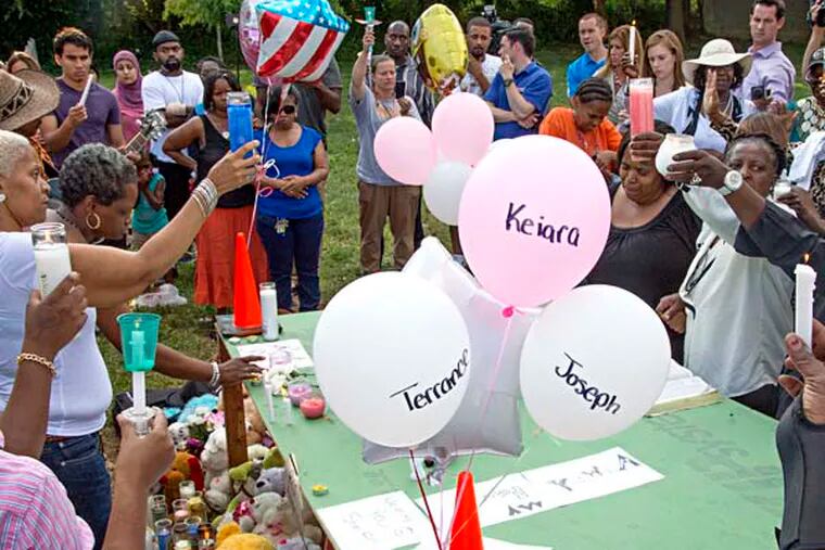 A memorial July 26, 2014 at the corner of Allegheny and Germantown Aves where three children were killed -- Keiara, Joseph and Terrance -- when a out-of-control carjacked SUV ran them over as they sold cold drinks yesterday.  ( CLEM MURRAY / Staff Photographer )