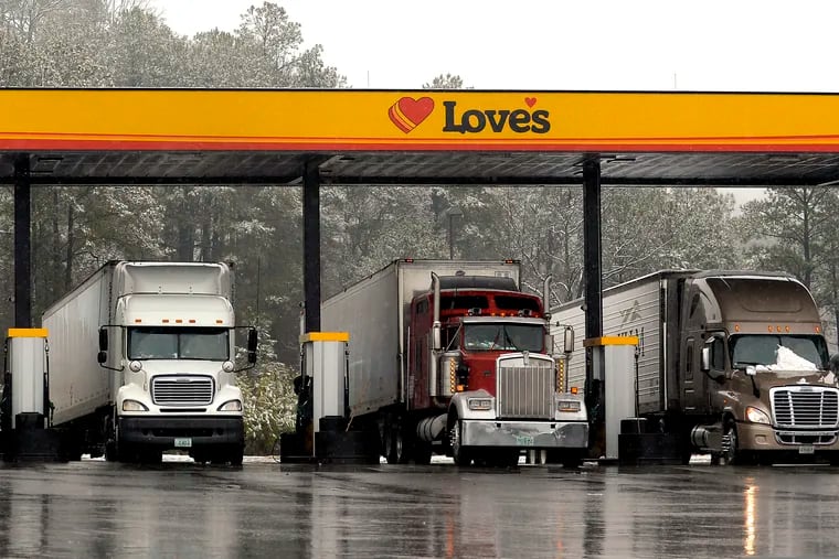 Truck drivers stop at a gas station in Emerson, Ga.