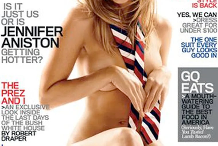 Fit to be in a tie: Actress Jennifer Aniston shows off her toned and tanned 39-year-old bod on the cover of GQ&#0039;s January issue.