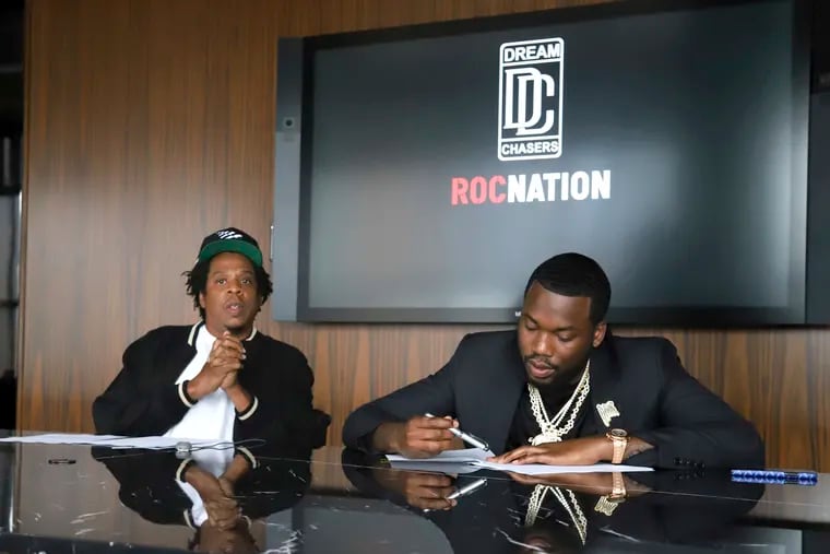 Jay-Z, left, and Meek Mill make an announcement of the launch of Dream Chasers record label in joint venture with Roc Nation, at the Roc Nation headquarters on Tuesday, July 23, 2019, in New York.