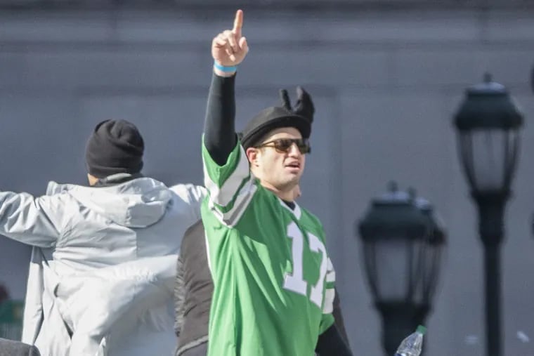 Eagle tight end Brent Celek, center, gestures to the crowd as he and his teammates travel to the parkway as part of the Eagles Super Bowl Parade on Thursday February 8, 2018. MICHAEL BRYANT / Staff Photographer