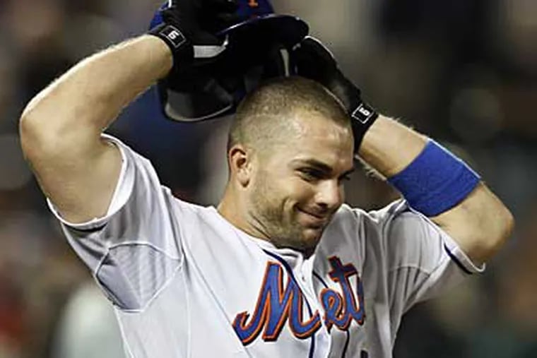Mets third baseman David Wright reacts after his liner in the 10th inning was caught by a diving Jayson Werth. (AP / Kathy Willens)