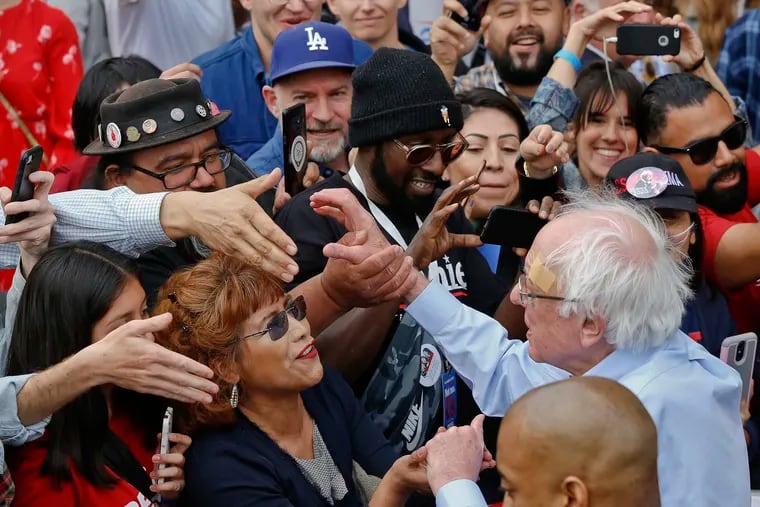 Democratic presidential candidate Sen. Bernie Sanders, I-Vt., greets supporters at a rally at Grand Park in Los Angeles, Saturday, March 23, 2019. The Vermont senator made a notable, second-place finish in California's 2016 presidential primary when he won 27 of 58 counties. (AP Photo/Damian Dovarganes)