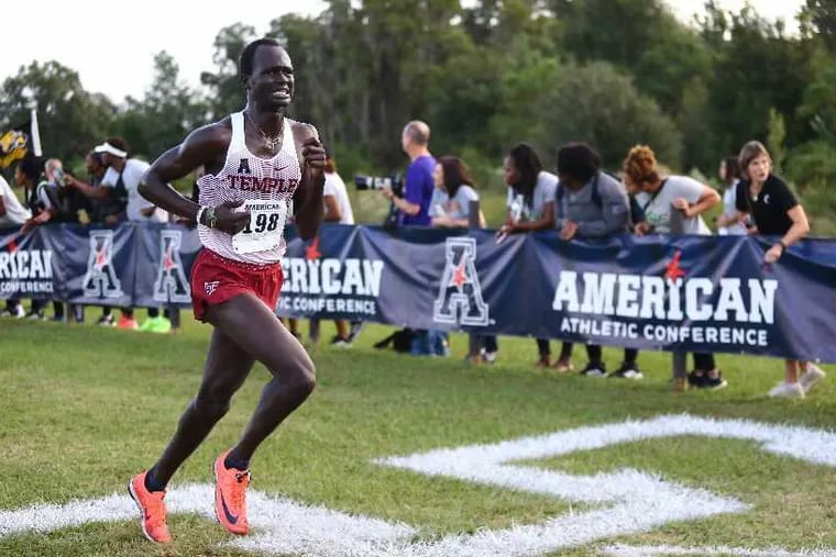 Temple freshman Liem Chot crosses the finish line in an American Athletic Conference race.