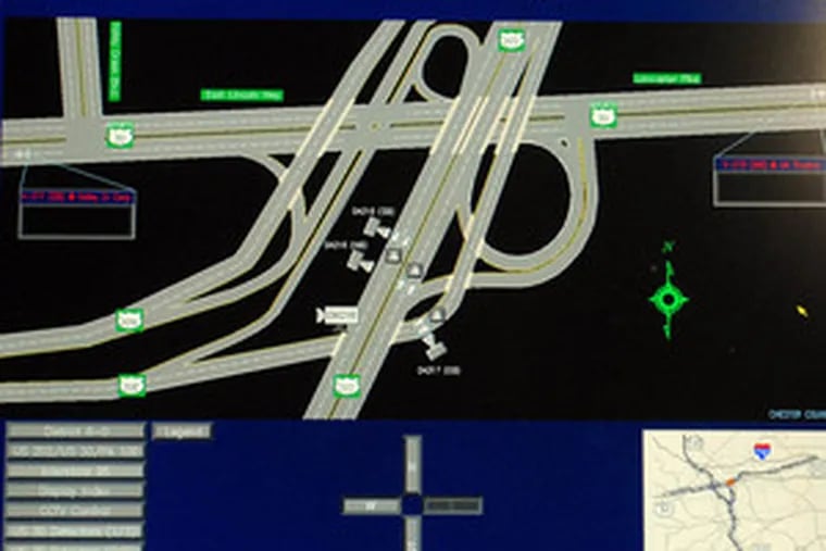 A computer screen displays a graphic of the intersection of Routes 202 and 30, showing the positions of highway cameras. Ultimately, 140 cameras will feed traffic information to PennDot&#0039;s video monitors.