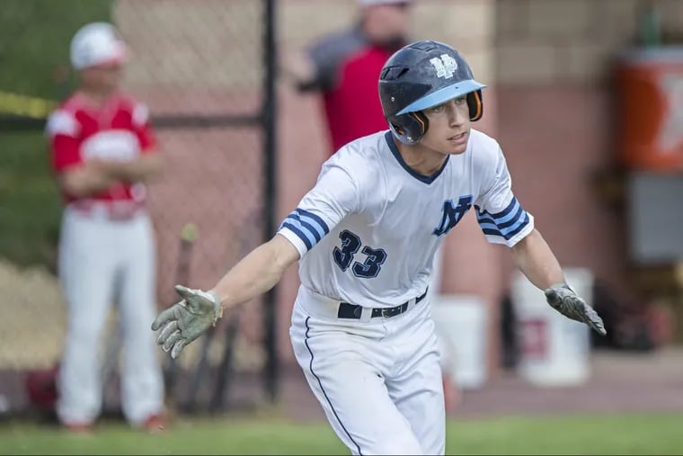 North Penn’s Tyler Siddal drops his bat and races toward first base in Tuesday’s 13-3 win over Souderton.