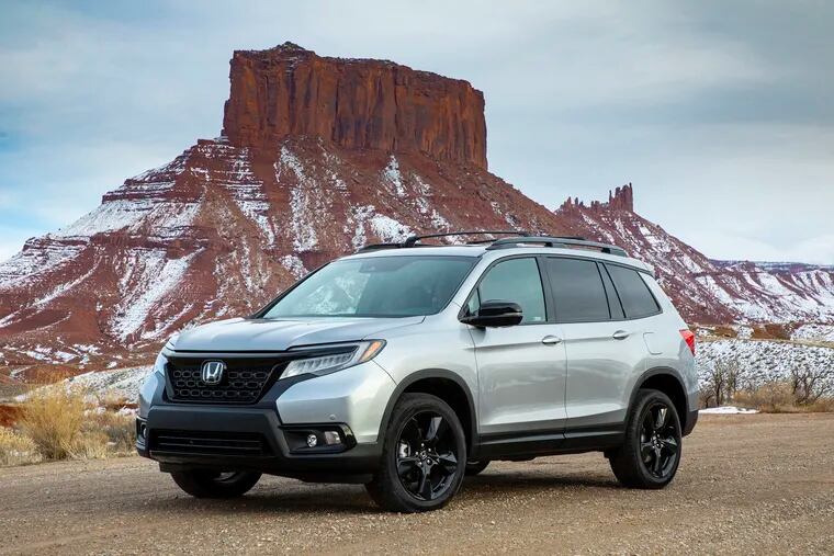 This undated photo provided by Honda shows the 2019 Honda Passport, one of the newest midsize SUVs available. Chevrolet and Honda make popular small and large crossover SUVs but have long lacked a choice in the middle. Interestingly, both companies decided to fill that gap this year with new models that revive nameplates of the past: the 2019 Chevrolet Blazer and the 2019 Honda Passport. (American Honda Motor Co. via AP)